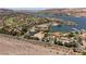 Lake Las Vegas aerial view showcasing residential areas, a marina, and the scenic lake at 12 Tatahatso Point St, Henderson, NV 89011