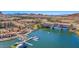 Aerial view of Lake Las Vegas featuring waterfront residences, a marina, and the tranquil waters of the lake at 12 Tatahatso Point St, Henderson, NV 89011