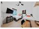 Inviting bedroom features two beds, ceiling fan and natural light at 12 Tatahatso Point St, Henderson, NV 89011