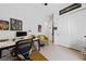 Bright bedroom featuring a desk, chair, and decorative artwork at 12 Tatahatso Point St, Henderson, NV 89011
