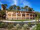 Grand entrance to Lake Las Vegas with lush landscaping, offering shopping, restaurants, and casino nearby at 12 Tatahatso Point St, Henderson, NV 89011