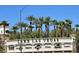 The Lake Las Vegas community sign featuring palm trees and logos for associated resorts and residential offerings at 12 Tatahatso Point St, Henderson, NV 89011