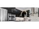 Bright and modern kitchen features stainless steel appliances at 12 Tatahatso Point St, Henderson, NV 89011