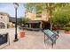 Street view featuring a restaurant with outdoor seating, directory sign, and appealing architecture at 12 Tatahatso Point St, Henderson, NV 89011