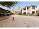 Charming street view with a fire hydrant, cafe, and casino in an upscale outdoor setting at 12 Tatahatso Point St, Henderson, NV 89011