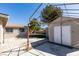 The home has a spacious backyard with a storage shed and covered patio at 1304 Virgil St, Las Vegas, NV 89110