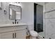 Stylish bathroom with a modern vanity, sleek fixtures, and a glass-enclosed shower at 1304 Virgil St, Las Vegas, NV 89110