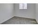 Bedroom features new carpet, window, and fresh paint at 1304 Virgil St, Las Vegas, NV 89110