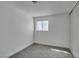 Bedroom with a large window, new carpet, and a closet at 1304 Virgil St, Las Vegas, NV 89110