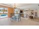 This is a bright and spacious living area near a pool with natural light at 1430 October Oak Ave, Las Vegas, NV 89123
