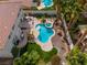 Backyard with a private pool, spa, manicured landscaping, and a patio for outdoor dining and entertaining at 1430 October Oak Ave, Las Vegas, NV 89123