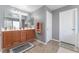 Bathroom features a double sink vanity, tile floors, and access to the toilet and shower at 150 Pocono Ranch Ave, North Las Vegas, NV 89031