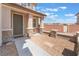 Inviting front porch with stone accents, a charming door, and minimalist desert landscaping at 150 Pocono Ranch Ave, North Las Vegas, NV 89031