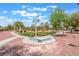 Beautiful community park featuring walking paths, lush greenery, and shaded seating areas at 150 Pocono Ranch Ave, North Las Vegas, NV 89031