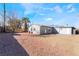 Large backyard with stone landscaping and trees at 1720 Hassett Ave, Las Vegas, NV 89104