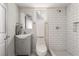 Updated bathroom featuring a white subway tile shower and modern vanity at 1720 Hassett Ave, Las Vegas, NV 89104