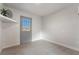 Bright room with wood-look floors, shelf decor, glass paneled door at 1720 Hassett Ave, Las Vegas, NV 89104