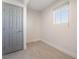 Cozy bedroom with a window and closet door at 1720 Hassett Ave, Las Vegas, NV 89104