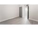 An empty bedroom features neutral walls, light flooring, a closet and a doorway at 1720 Hassett Ave, Las Vegas, NV 89104