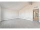 Bright, airy bedroom with vaulted ceilings, neutral walls and wood-look flooring at 1720 Hassett Ave, Las Vegas, NV 89104