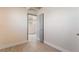 View of a bedroom with grey door at 1720 Hassett Ave, Las Vegas, NV 89104
