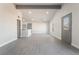 Spacious, light-filled living room with wood-look flooring, recessed lighting and modern finishes at 1720 Hassett Ave, Las Vegas, NV 89104