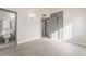 A primary suite with gray walls and light gray vinyl floors has an ensuite bathroom at 1720 Hassett Ave, Las Vegas, NV 89104