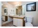 Bright bathroom with a vanity, large mirror, and tiled flooring at 223 Hunter Ridge Rd # 300, Brian Head, UT 84719