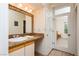 Bathroom featuring granite counters, sink, and door to a bedroom at 223 Hunter Ridge Rd # 300, Brian Head, UT 84719