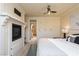 Inviting bedroom featuring a fireplace, ceiling fan, and neutral decor at 223 Hunter Ridge Rd # 300, Brian Head, UT 84719