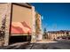 Exterior shot of a garage with mountain art and parking in front of the building at 223 Hunter Ridge Rd # 300, Brian Head, UT 84719