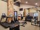 Well-equipped gym with treadmills, bikes, weights, and mirrored wall at 223 Hunter Ridge Rd # 300, Brian Head, UT 84719