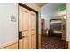 Hallway with elevator and numbered suite entry, plus an 'exit' sign overhead at 223 Hunter Ridge Rd # 300, Brian Head, UT 84719