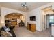 Cozy living room with kitchen, seating, and an archway at 223 Hunter Ridge Rd # 300, Brian Head, UT 84719