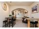 Wide open living room with open kitchen concept, high ceilings, and casual seating at 223 Hunter Ridge Rd # 300, Brian Head, UT 84719