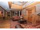 Lobby sitting area featuring sofa seating and stone and wood accents at 223 Hunter Ridge Rd # 300, Brian Head, UT 84719