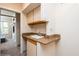 Wet bar with granite counters, sink, and view to living room at 223 Hunter Ridge Rd # 300, Brian Head, UT 84719