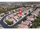An aerial view of a well-manicured community with red tile roofs at 2251 Summerwind Cir, Henderson, NV 89052