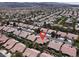 Aerial view features the desert community, showing roof styles and community layout at 2251 Summerwind Cir, Henderson, NV 89052
