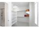 Walk-in closet with built in shelving and easy access to glass enclosed shower at 2251 Summerwind Cir, Henderson, NV 89052