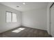 Bedroom featuring plush carpeting and a window with sunlight at 2636 Lily Point St, Las Vegas, NV 89156