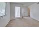 Bedroom with neutral carpet, window, and doorway leading to closet or ensuite at 2681 Ruthe Duarte Ave, Las Vegas, NV 89121