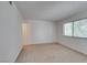 Bright bedroom with neutral carpet, and a window providing natural light at 2681 Ruthe Duarte Ave, Las Vegas, NV 89121