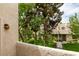 Exterior view showcasing a multi-story building surrounded by lush greenery and well-maintained lawns at 2681 Ruthe Duarte Ave, Las Vegas, NV 89121