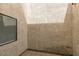 Exterior view of a beige stucco wall with a window at 2681 Ruthe Duarte Ave, Las Vegas, NV 89121