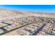 Expansive aerial view showcases a well-planned community with desert landscaping, wide streets, and mountain views at 2727 Chinaberry Hill St, Laughlin, NV 89029