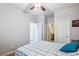 Well-lit bedroom with ensuite bathroom, decorative tile floors, and a calming color scheme at 2727 Chinaberry Hill St, Laughlin, NV 89029