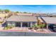 Charming single-Gathering homes with well-maintained landscaping, tile roofs, and paved driveways for a welcoming curb appeal at 2727 Chinaberry Hill St, Laughlin, NV 89029