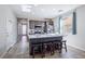 Modern kitchen with stainless steel appliances, granite countertops, island seating, and ample cabinet space at 2727 Chinaberry Hill St, Laughlin, NV 89029