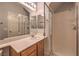 A clean, bright bathroom features a glass-enclosed shower and a modern vanity with ample counter space at 2749 Carolina Blue Ave, Henderson, NV 89052